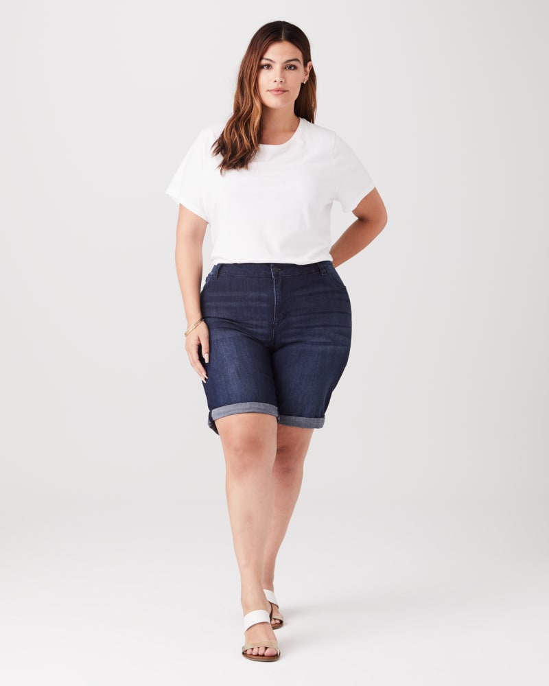 Plus size model with pear body shape wearing Skylar Cuffed Denim Shorts by Celebrity Pink | Dia&Co | dia_product_style_image_id:134215